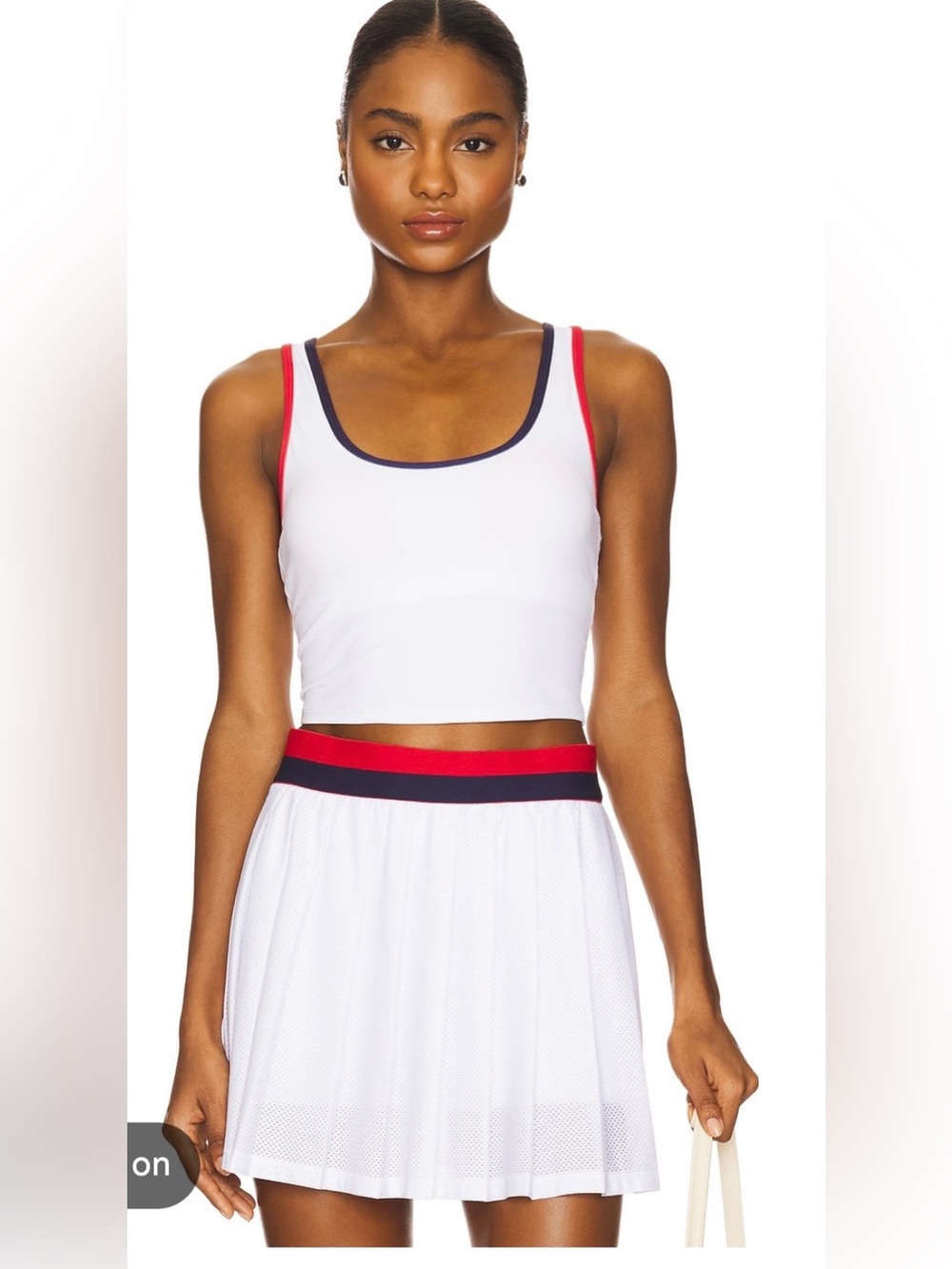 Beach Riot White Sports Crop Top with Navy & Red Trim matching skort set.